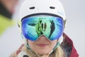 Kaltenbach Ã¢â¬â¹Hochfugen, Austria - 11 Jan, 2020: Glare of a group of snowboarders in a ski mask of a girl in a helmet Royalty Free Stock Photo